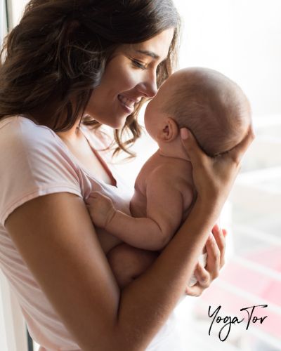 Mama mit Baby im Arm